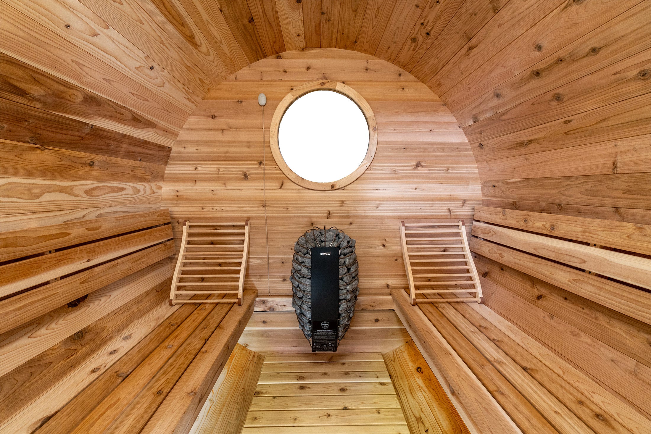 cedar barrel sauna interior with 18" circular window