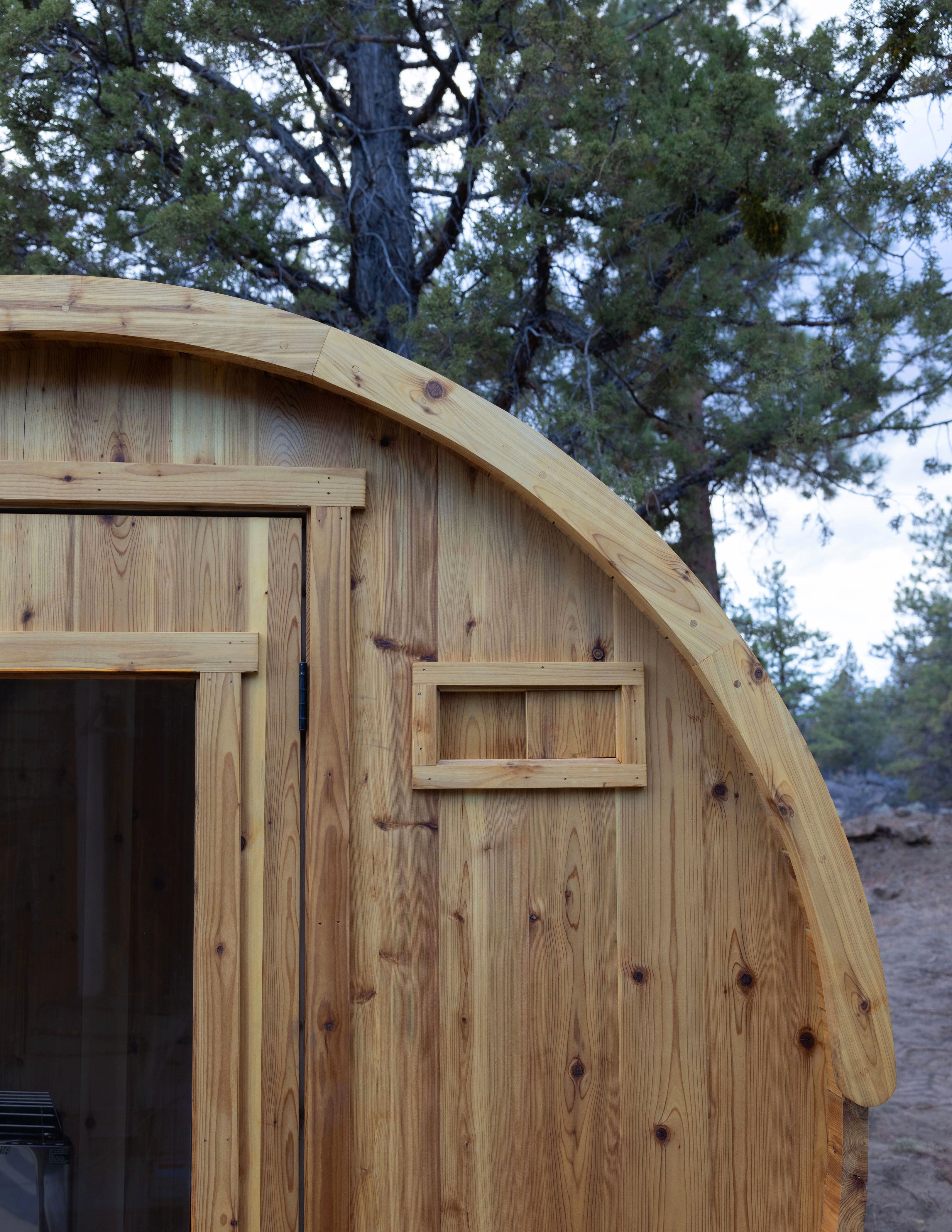 Close up of a wooden barrel sauna arch